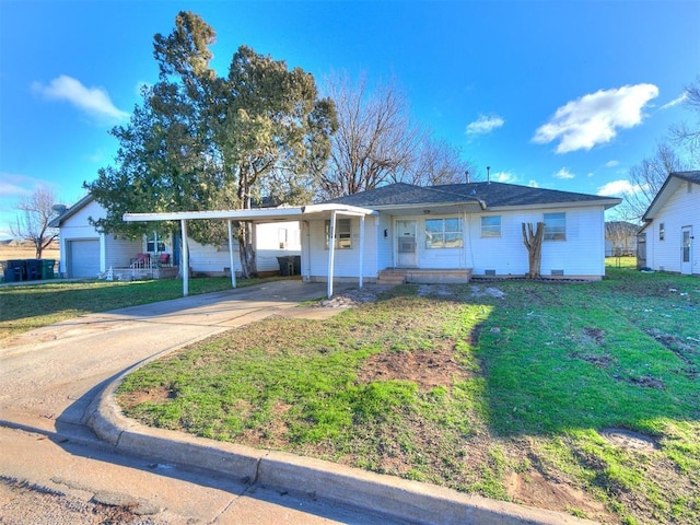 ranch-style home with a front yard and a carport