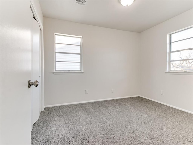 view of carpeted spare room