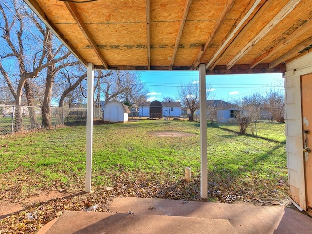 view of yard with a storage shed