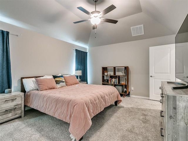 bedroom with carpet flooring, ceiling fan, and vaulted ceiling