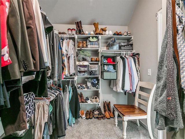 walk in closet featuring carpet floors