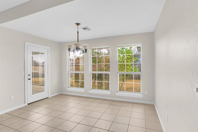 unfurnished dining area with light tile patterned flooring and a chandelier