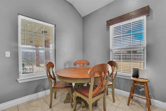 103 Ranch Rd, Elk City, OK 73644 - tiled dining area featuring plenty of natural light and vaulted ceiling