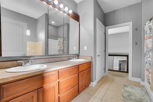 103 Ranch Rd, Elk City, OK 73644 - bathroom featuring a shower with shower curtain, vanity, and tile patterned floors