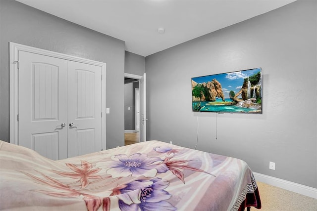103 Ranch Rd, Elk City, OK 73644 - bedroom featuring a closet and carpet floors