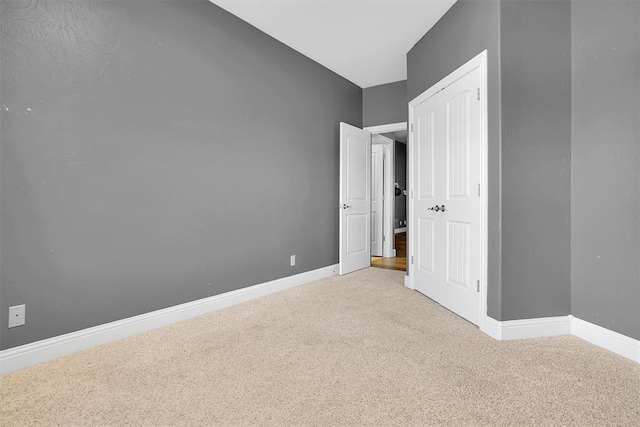 103 Ranch Rd, Elk City, OK 73644 - unfurnished bedroom featuring light colored carpet