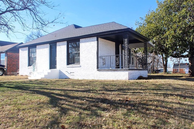 view of property exterior with a lawn