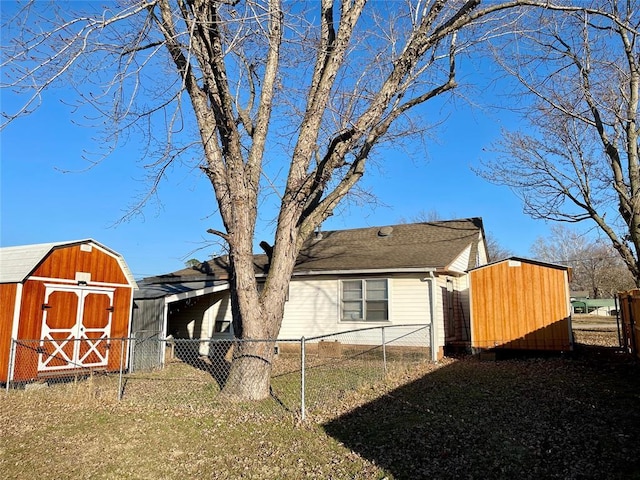 view of property exterior with a shed