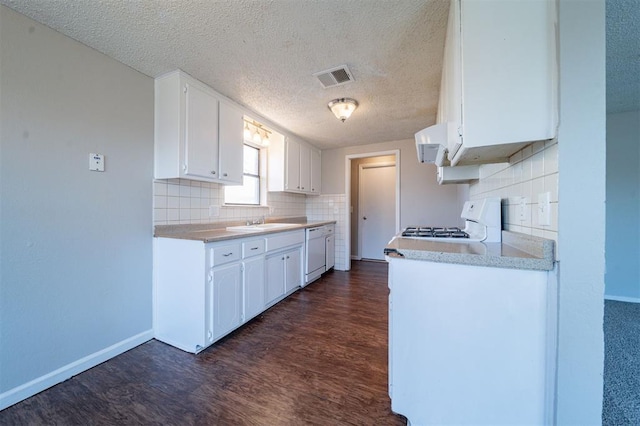 kitchen featuring sink, extractor fan, white cabinetry, dark hardwood / wood-style floors, and dishwasher