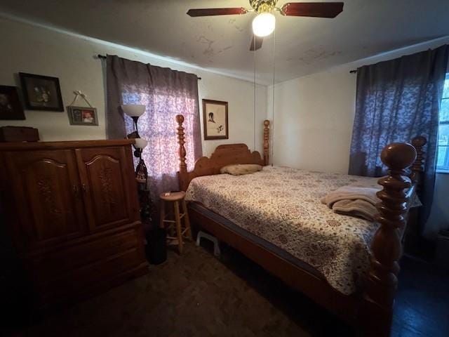 carpeted bedroom with a ceiling fan