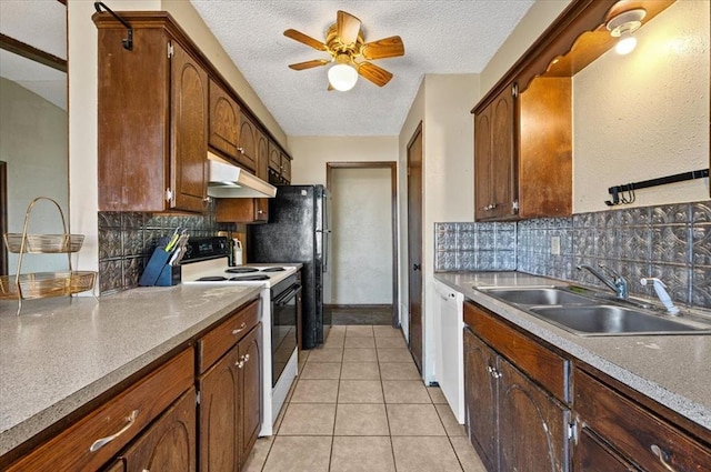 kitchen featuring ceiling fan, sink, backsplash, a textured ceiling, and white appliances