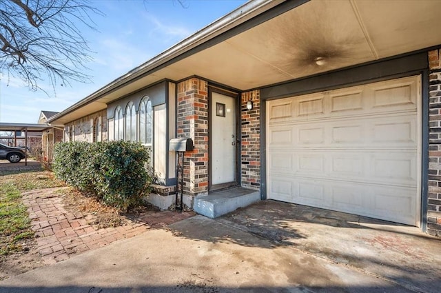 property entrance with a garage