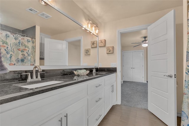 bathroom with vanity and ceiling fan