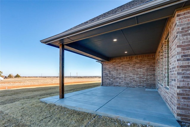 view of patio with a rural view