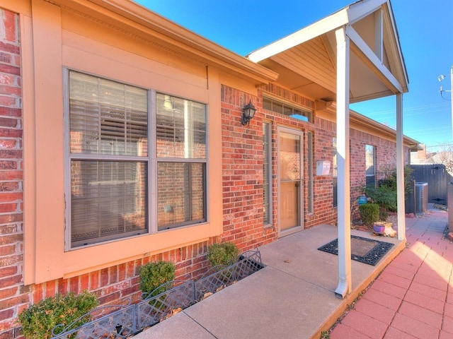 entrance to property featuring a patio area