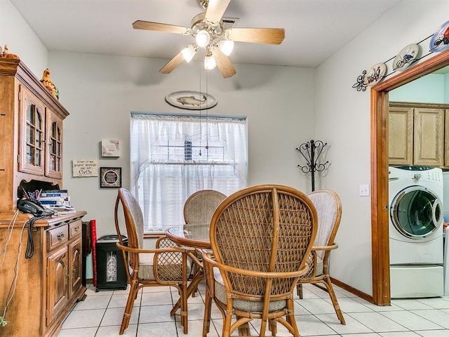 dining room featuring washer / clothes dryer, ceiling fan, and light tile patterned floors