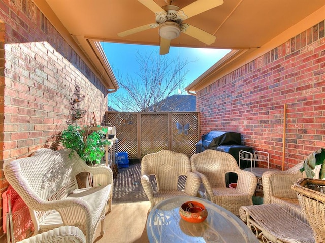 view of patio / terrace with a grill and ceiling fan