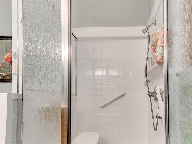 bathroom featuring an enclosed shower