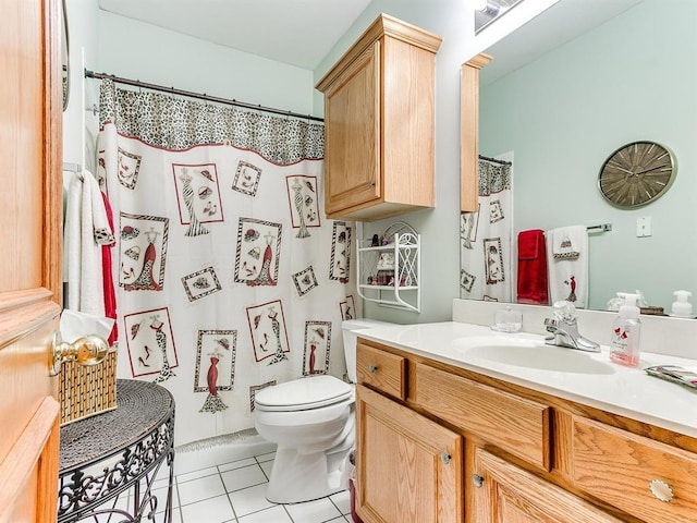 bathroom with tile patterned flooring, vanity, toilet, and a shower with shower curtain