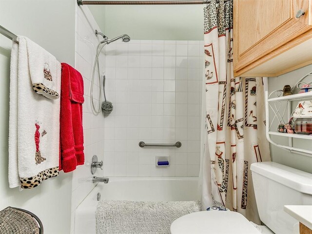 bathroom with toilet and shower / bathtub combination with curtain