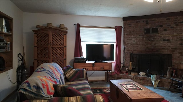 427 Lillie Rd, Hydro, OK 73048 - carpeted living room with a fireplace and visible vents