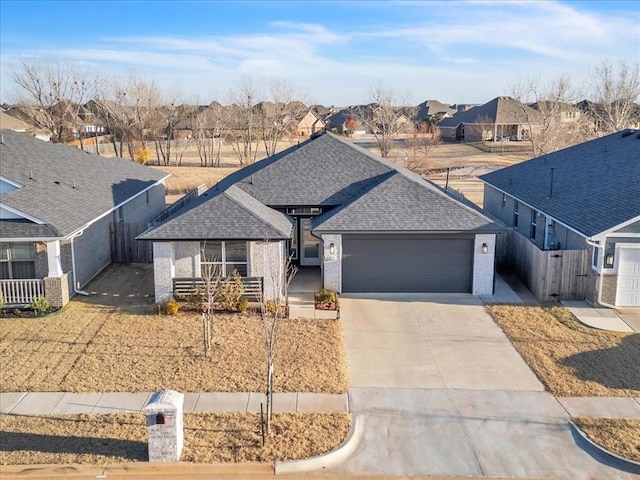 ranch-style house featuring a garage