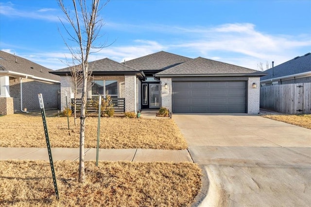 ranch-style home featuring a garage