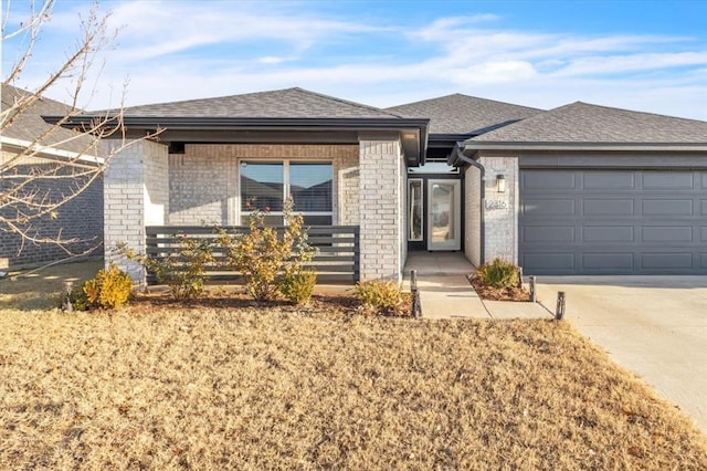 view of front of property with a garage