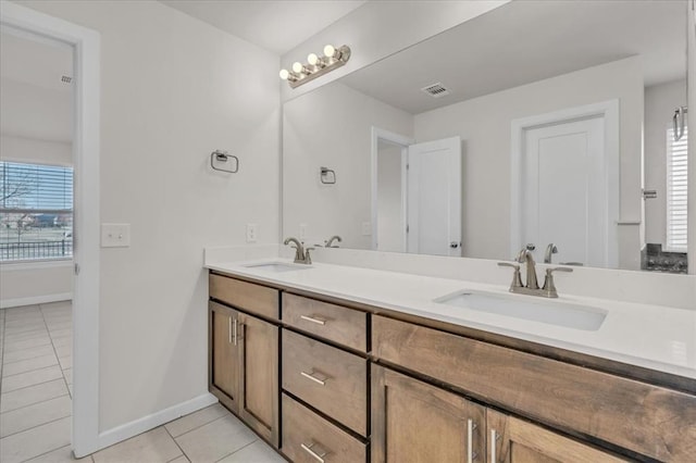 bathroom featuring vanity and tile patterned floors