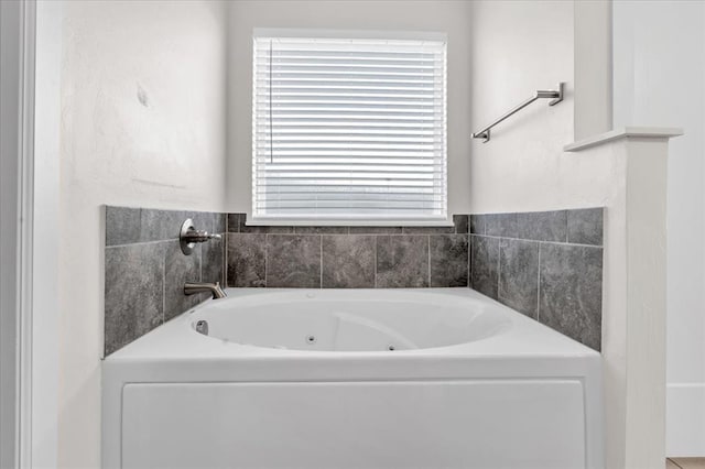 bathroom with a washtub