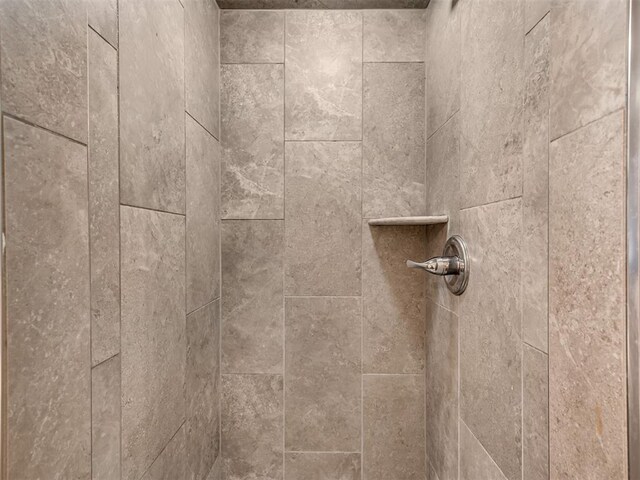 details featuring a tile shower