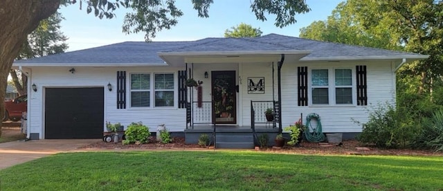 ranch-style house with a front lawn and a garage