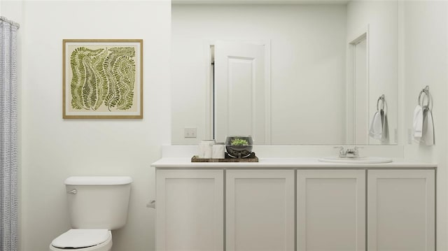 bathroom with vanity and toilet