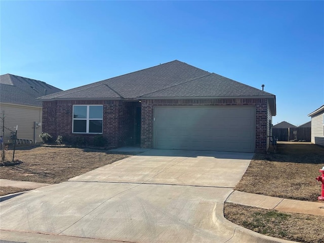 single story home featuring a garage