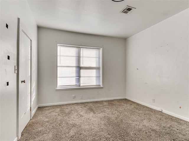 spare room with carpet flooring