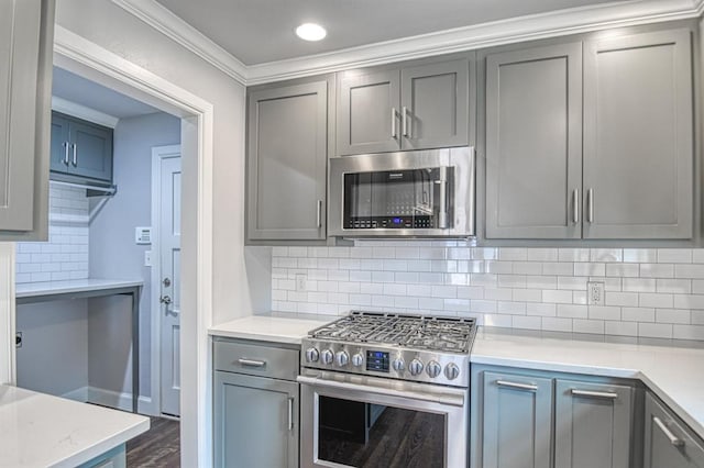 kitchen featuring appliances with stainless steel finishes and gray cabinets