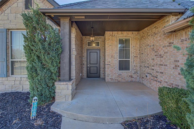 entrance to property with covered porch