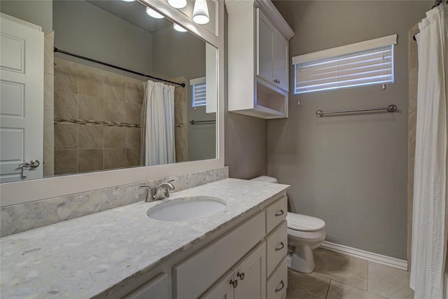 bathroom with tile patterned floors, vanity, toilet, and a shower with curtain