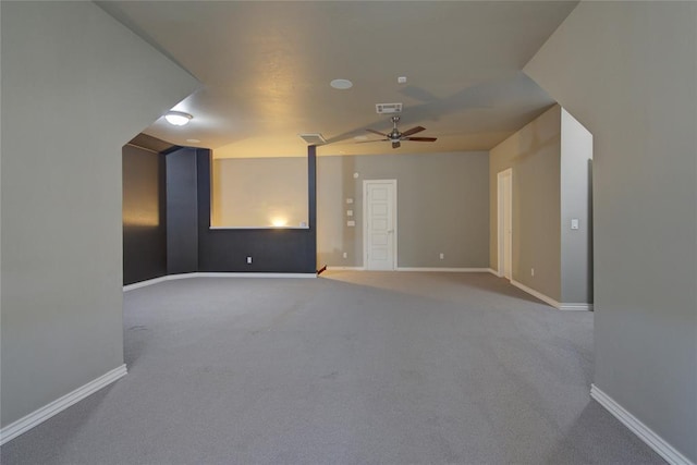 spare room with light carpet and ceiling fan