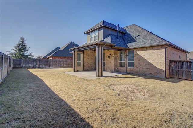 rear view of property with a patio