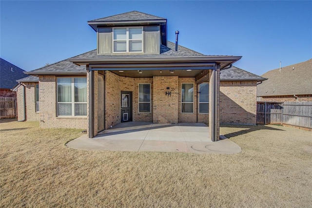 rear view of property with a patio