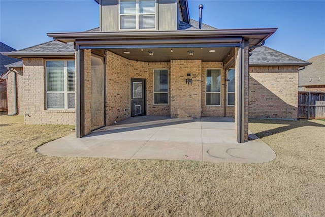 rear view of house featuring a patio