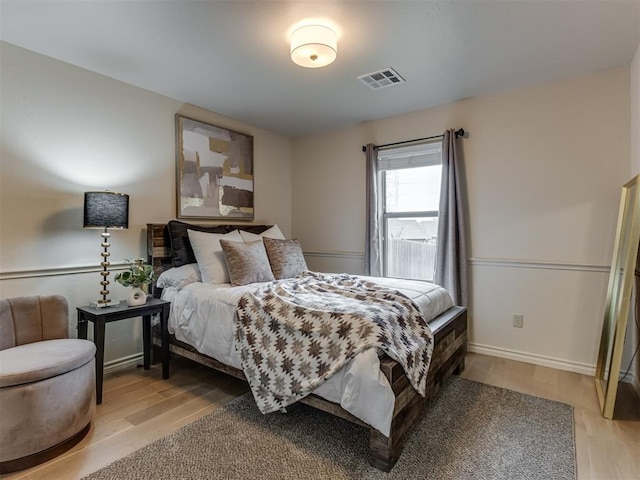 bedroom featuring light wood-type flooring