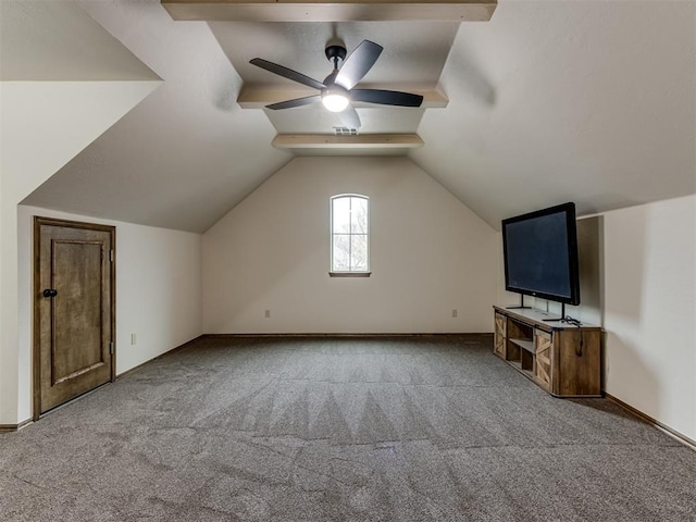 additional living space with vaulted ceiling, light carpet, and ceiling fan