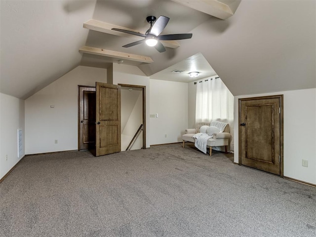 bonus room with vaulted ceiling with beams, carpet floors, and ceiling fan