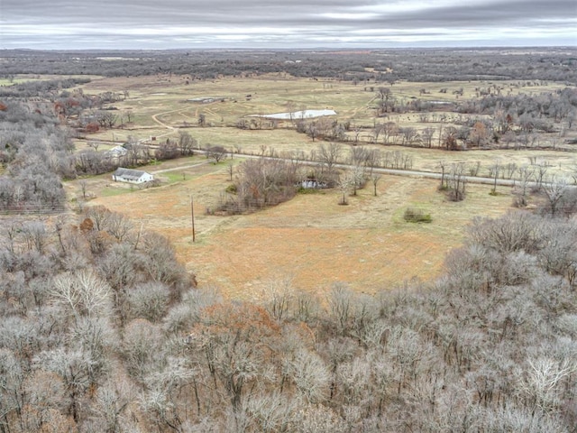 birds eye view of property featuring a rural view