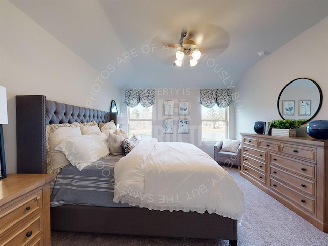 bedroom with carpet floors, multiple windows, lofted ceiling, and ceiling fan