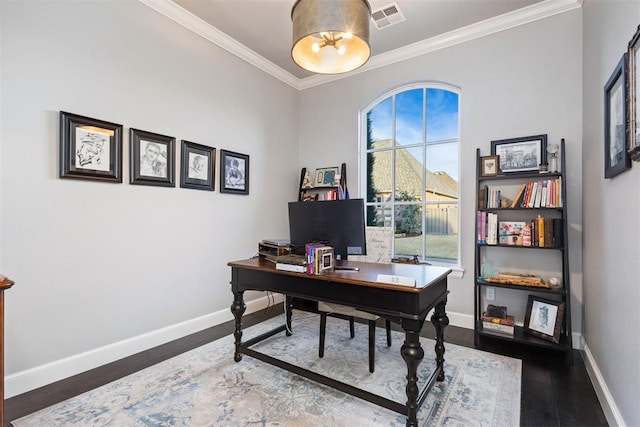 office area with ornamental molding and dark wood-type flooring