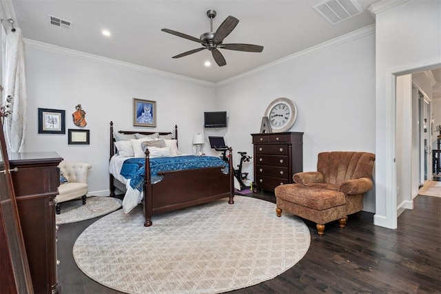 bedroom featuring crown molding, ceiling fan, and dark hardwood / wood-style floors