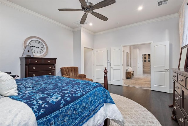 bedroom with ornamental molding, dark hardwood / wood-style floors, and ceiling fan